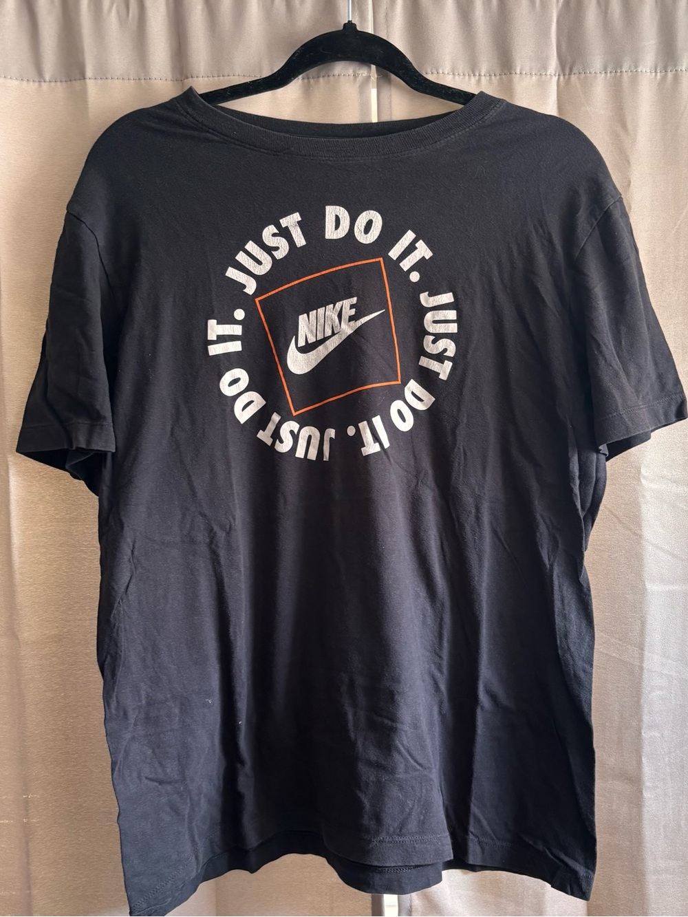 Nike Black Short-Sleeve 'Just Do It' Graphic Tee with Orange Accent